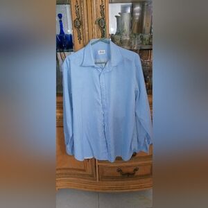 2 blue shirts; 1 gray shirt with strips and 1 blue shirt with stripes. Brioni